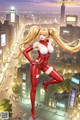 A woman in a red latex outfit standing in the middle of a city.